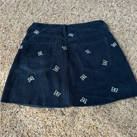 Women’s corduroy navy blue mini skirt from PacSun with butterfly detail - Picture 2 of 5